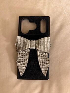 Black Phone Case with Sparkling Silver Rhinestone Bow Accent iPhone 17pro